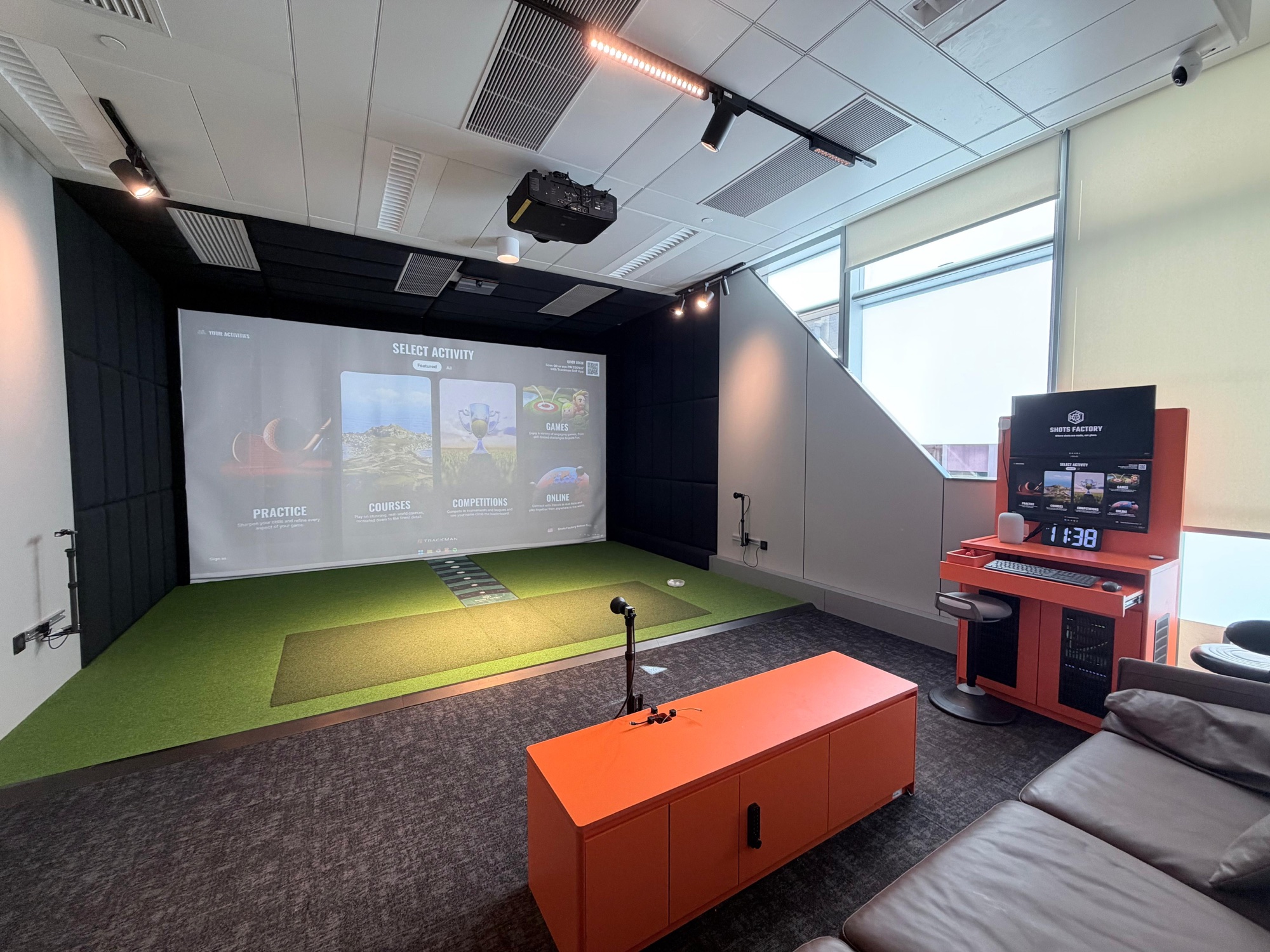 A bright private TrackMan bay at Shots Factory Wanchai